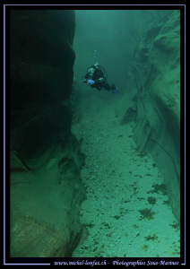 My Wife Caroline exploring the walls of the Verzasca Rive... by Michel Lonfat 